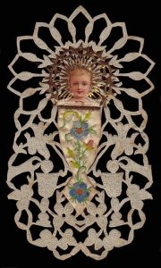 Bambino with birds hand cut and ornamented 1800s France