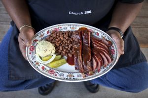 Reverend Clint Edison at New Zion Missionary Baptist Barbecue in Huntsville, TX © O. Rufus Lovett