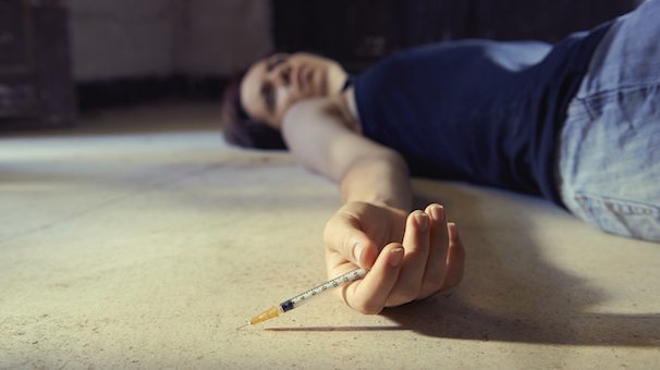 woman overdosing with heroin